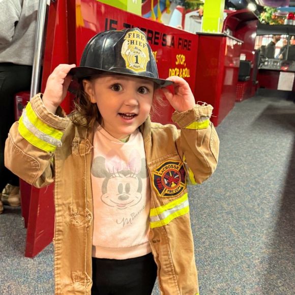 Children playing in a treehouse